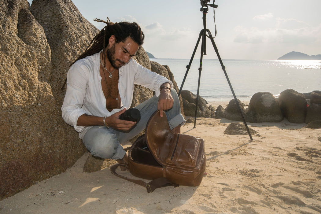 brown leather camera bag