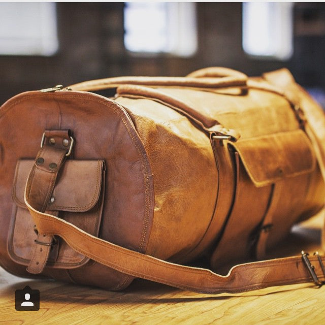 Round leather holdall bag